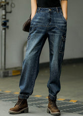 Lässige blaue Patchwork-Taschen mit hoher Taille Baumwoll-Jeanshose